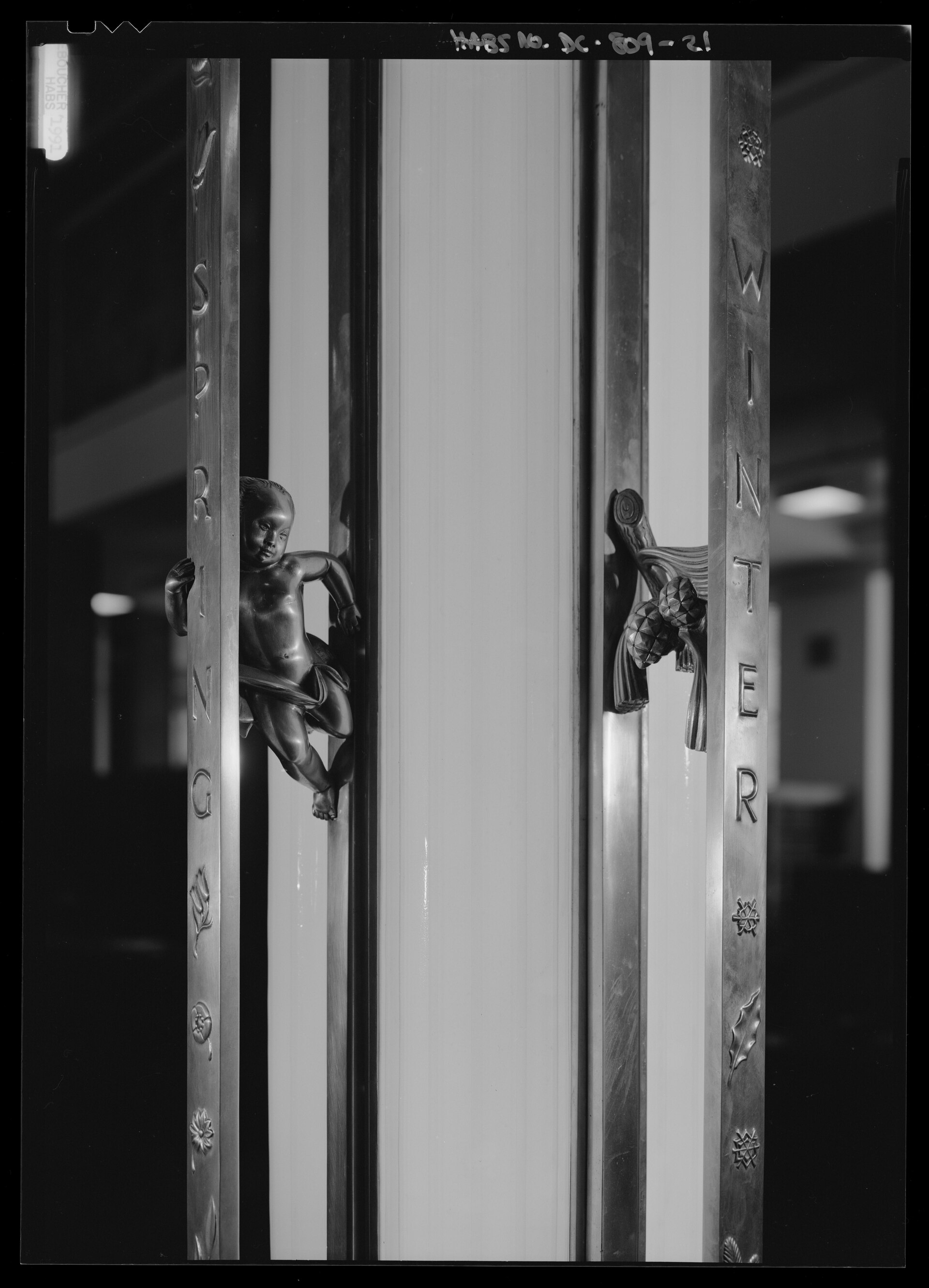 Detail view of lamp in law library; Jennewein modeled symbols of the four seasons on the lamp's aluminum supports - United States Department of Justice, Constitution Avenue between Ninth and Tenth Streets, Northwest, Washington, District of Columbia, DC